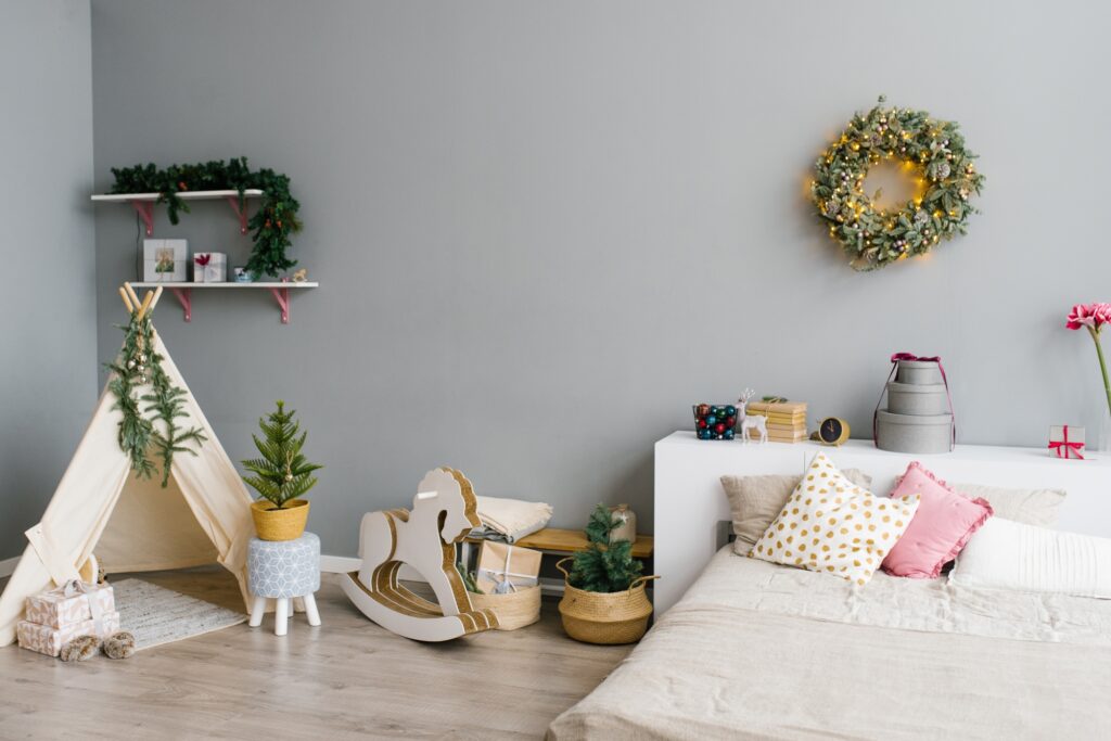 A child's room decorated for the holidays in the concept of 'How to Pack Household Items Safely for a Move to Leyton'.